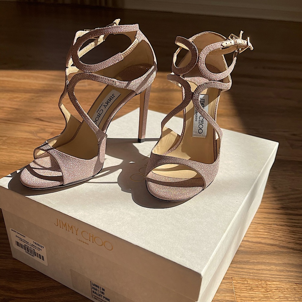 Jimmy Choo Lang asymmetric glittered heels.